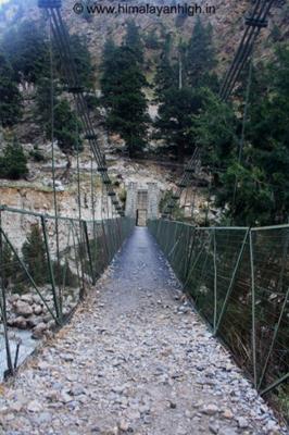 trek starts with crossing the suspension bridge in Jumma